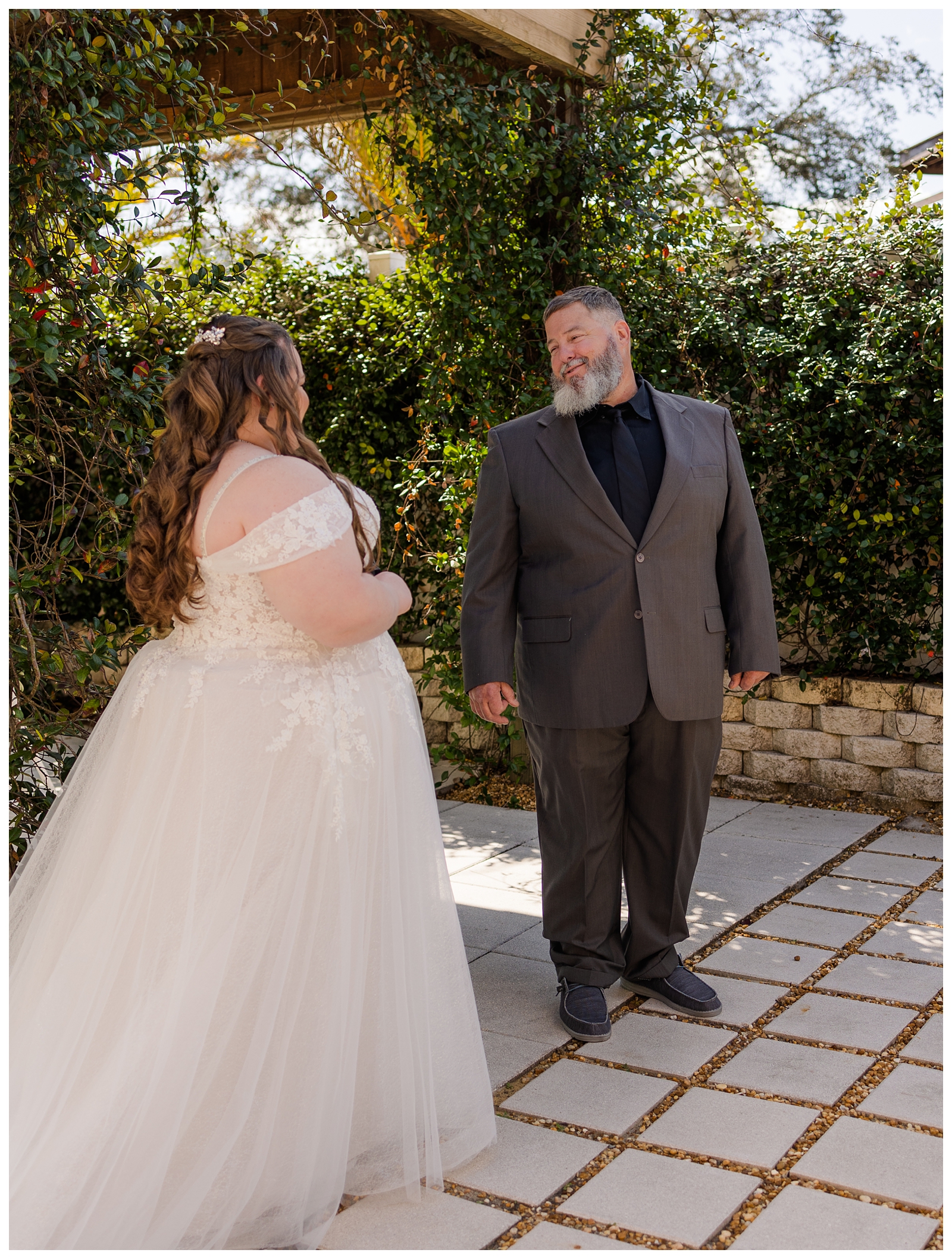 Father and daughter first look on wedding day