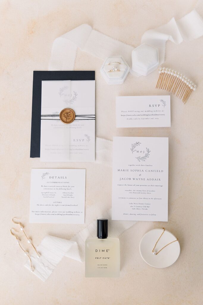 Flatlay Detail Photos of Bride and Grooms details on the morning of their wedding captured by Orlando Wedding Photographer Blak Marie Photography