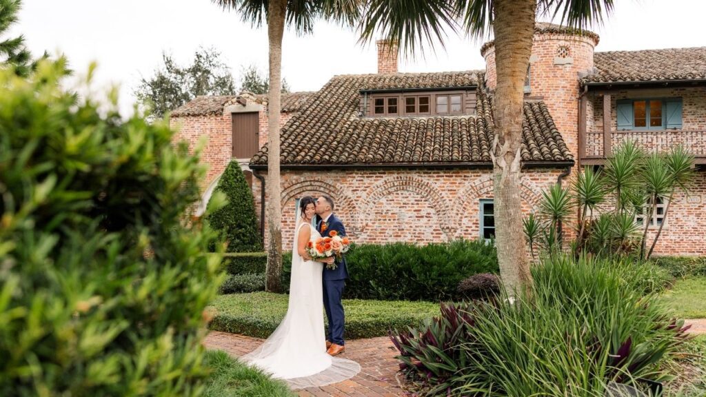Bride and groom sharing an intimate portrait in the gardens at Casa Feliz wedding venue in Winter Park near Orlando Florida